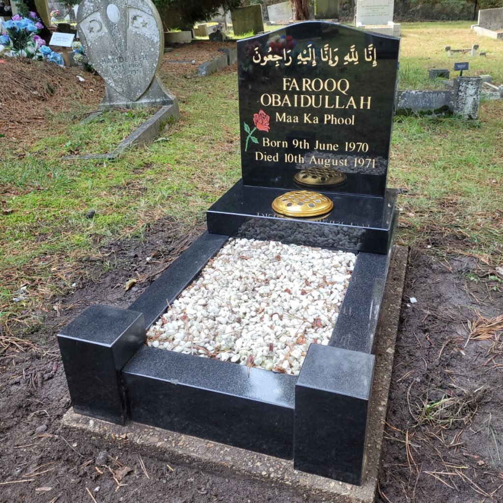 black and gold headstone by prince stone masons 3